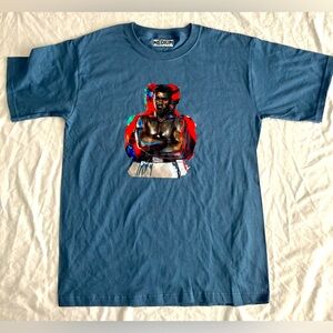 Ali | Chuck Styles Art “Stand Strong” Men’s Blue Tee Size Medium